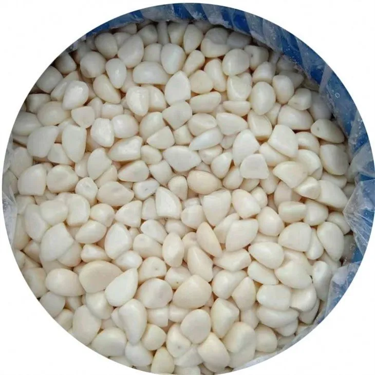 Marinated garlic in brine in drums